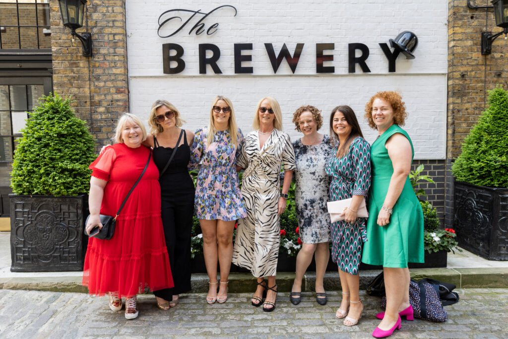 RCM Awards Guests by Brewery Sign