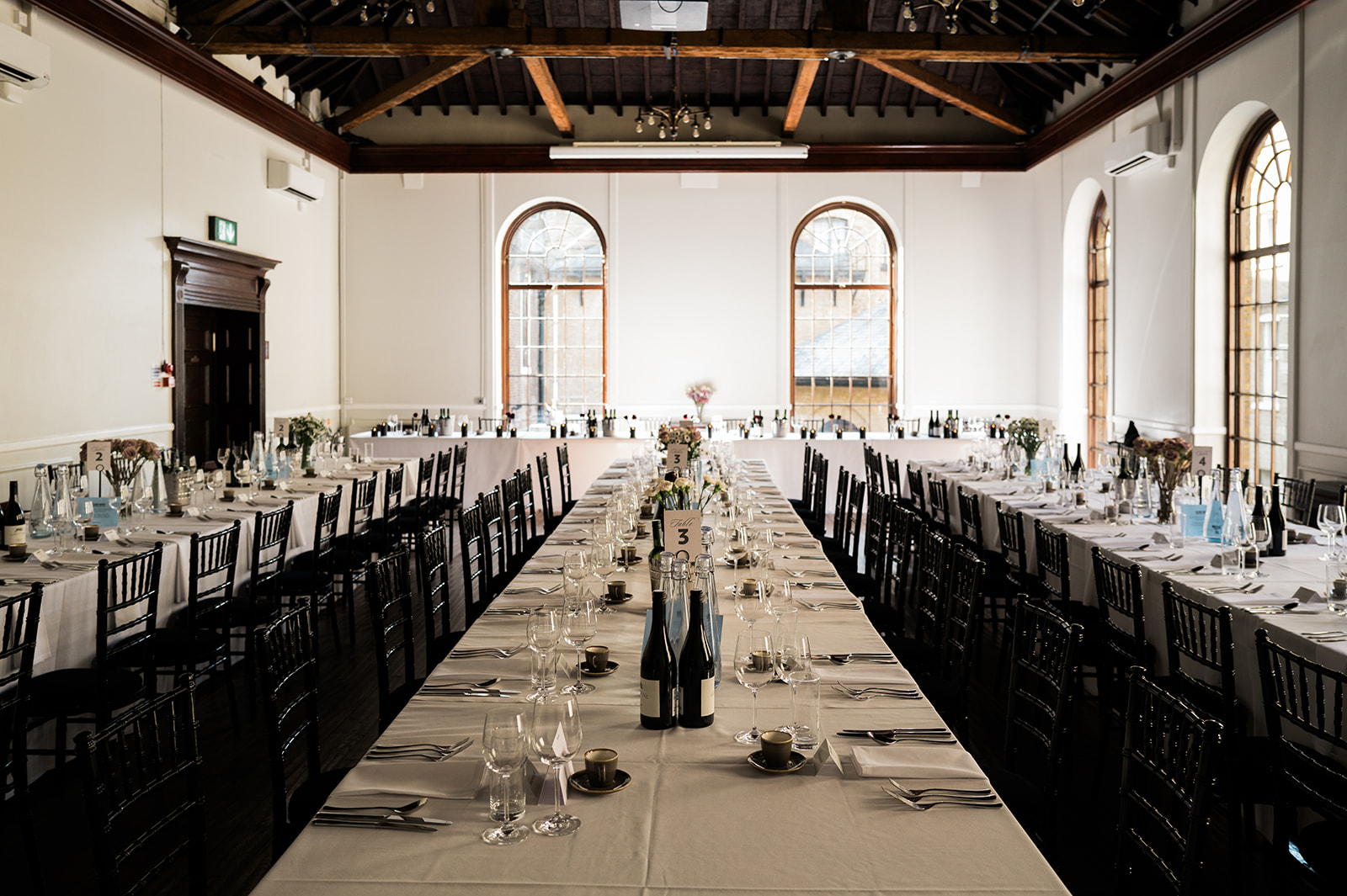 Wedding Breakfast with banquet tables in the Upper Sugar Rooms - Shalene & Michael's Wedding