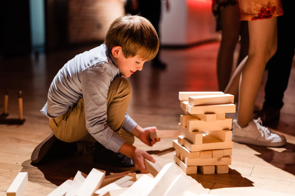 Child Playing Giant Jenga