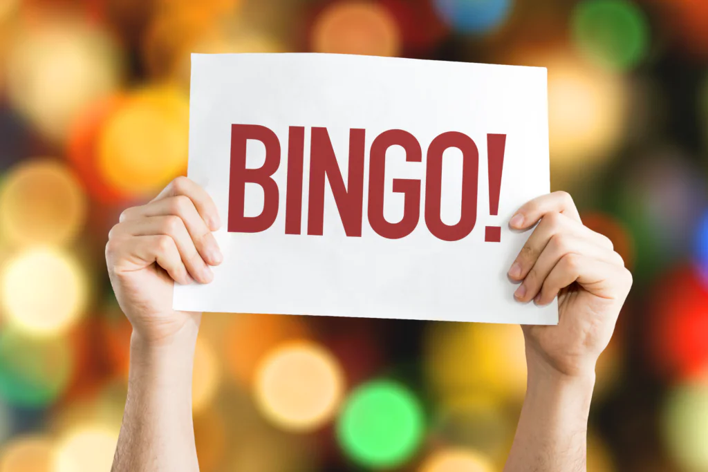 Hands holding up a bingo sign